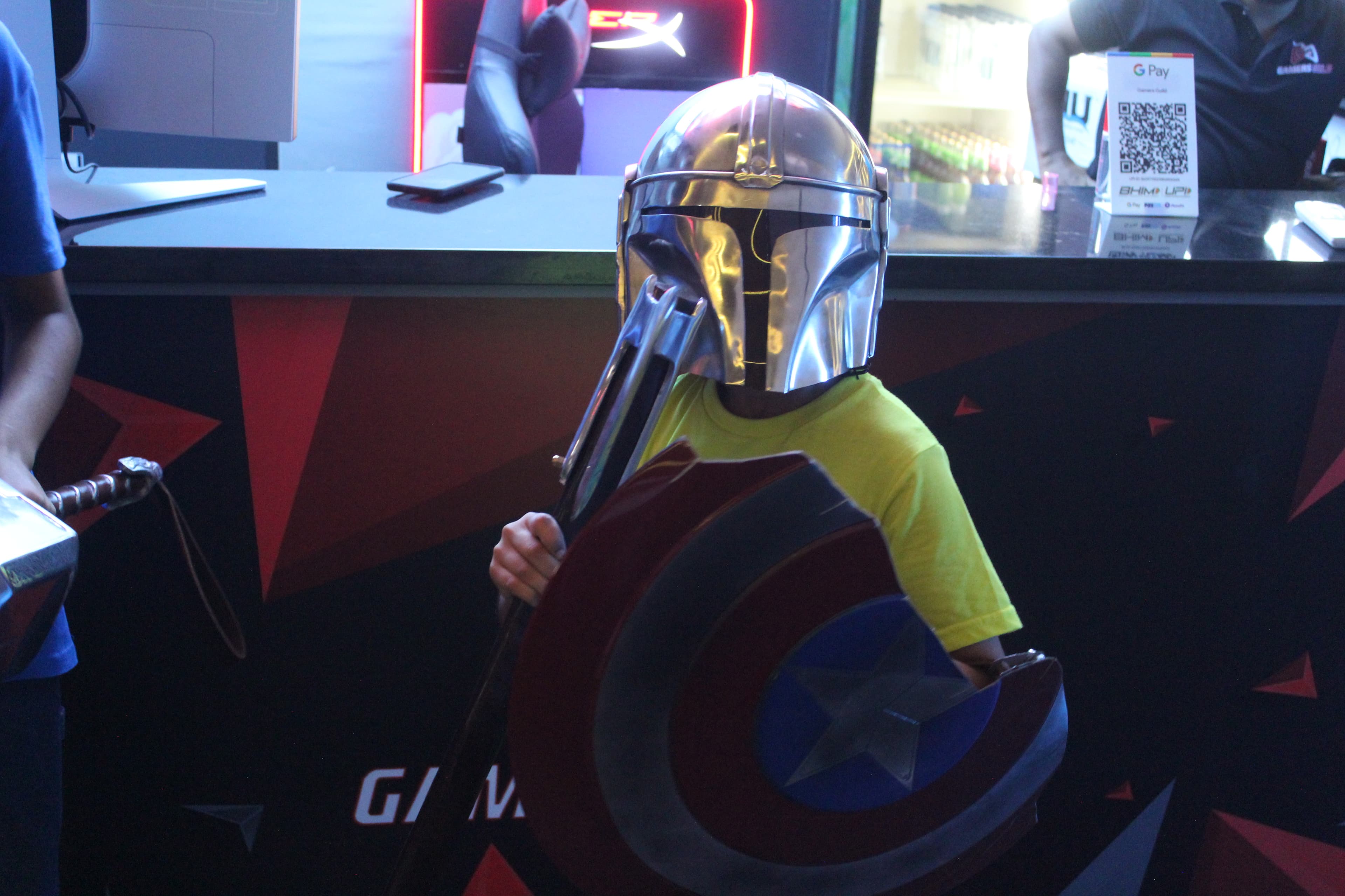 A young guest in cosplay at a Gamers Guild birthday event